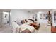 Spacious basement features seating and open space at 1741 W 55Th Pl, Denver, CO 80221