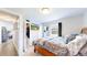 Comfortable bedroom with TV and closet at 1741 W 55Th Pl, Denver, CO 80221