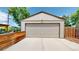 Detached garage with ample parking space and convenient access to the property at 1741 W 55Th Pl, Denver, CO 80221
