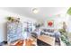 Open living room with hardwood floors, cozy seating, and modern decor at 1741 W 55Th Pl, Denver, CO 80221