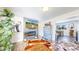 Cozy living room with a modern fireplace, stylish decor, and hardwood floors at 1741 W 55Th Pl, Denver, CO 80221