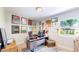 Comfortable home office featuring a large desk and ample natural light at 1741 W 55Th Pl, Denver, CO 80221