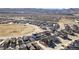 Panoramic aerial view of a residential neighborhood featuring modern homes and ample green spaces at 8211 Monte Vista Cir, Littleton, CO 80125