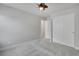 Spacious bedroom featuring a ceiling fan and a closet at 8211 Monte Vista Cir, Littleton, CO 80125