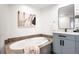 Elegant bathroom features a luxurious soaking tub, modern vanity, and stylish decor for a relaxing retreat at 1435 Wazee St # 305, Denver, CO 80202