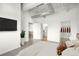 Bright primary bedroom with hardwood floors and access to closet and bathroom at 1435 Wazee St # 305, Denver, CO 80202