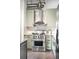 Close-up of a kitchen featuring modern appliances, stainless steel range and sleek cabinetry at 1435 Wazee St # 305, Denver, CO 80202