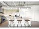 Modern kitchen with sleek countertops, stainless steel appliances, and a breakfast bar at 1435 Wazee St # 305, Denver, CO 80202