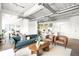 Stylish living room with an open layout that seamlessly connects to the kitchen and dining area at 1435 Wazee St # 305, Denver, CO 80202