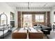 Inviting living room featuring a fireplace, exposed brick wall and comfortable seating area at 1435 Wazee St # 305, Denver, CO 80202