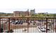 Balcony view overlooking street parking and nearby buildings at 1435 Wazee St # 305, Denver, CO 80202