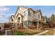 Charming townhome exterior with well-maintained landscaping and a welcoming entrance at 22675 E Ontario Dr # 202, Aurora, CO 80016