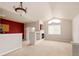 Open living area with vaulted ceilings, a cozy fireplace, and lots of natural light at 22675 E Ontario Dr # 202, Aurora, CO 80016