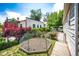 Charming backyard featuring an octagonal garden and lush greenery at 2268 Jay St, Edgewater, CO 80214