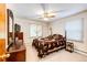 Bright bedroom with a ceiling fan, and a decorative quilt on the bed at 2268 Jay St, Edgewater, CO 80214