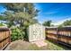 Backyard shed with double doors and a light green paint at 2268 Jay St, Edgewater, CO 80214