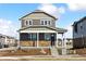 Charming two-story home with stone accents, covered porch and a well-maintained yard in a quiet neighborhood at 28640 E 8Th Pl, Watkins, CO 80137