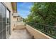 A peaceful balcony with a lovely view and sliding door access to the indoors at 8623 E Dry Creek Rd # 423, Englewood, CO 80112