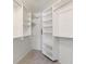 Walk-in closet featuring shelving and hanging rods at 8623 E Dry Creek Rd # 423, Englewood, CO 80112