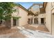 Exterior view of the building with balconies, covered walkways, and neat landscaping at 8623 E Dry Creek Rd # 423, Englewood, CO 80112