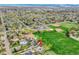 Aerial view showcasing the home's location near park, green space, and community baseball fields at 215 Jay St, Lakewood, CO 80226