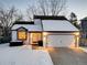 Attractive exterior of a two-story home with a snow-covered front yard at 11690 W Berry Ave, Littleton, CO 80127