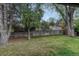 Spacious backyard with a wooden fence, offering privacy and room for outdoor activities at 17390 E Greenwood Cir, Aurora, CO 80013