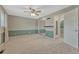 This bedroom features a mirror closet and an ensuite bathroom at 17390 E Greenwood Cir, Aurora, CO 80013
