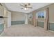 Comfortable bedroom with plush carpet and natural light from two windows at 17390 E Greenwood Cir, Aurora, CO 80013