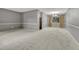 Bright and airy living room with neutral carpet, perfect for a comfortable and inviting space at 17390 E Greenwood Cir, Aurora, CO 80013