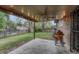 Outdoor patio featuring a ceiling fan and grilling area, ideal for entertaining guests at 17390 E Greenwood Cir, Aurora, CO 80013