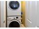 Laundry area featuring stacked washer and dryer units at 3401 N Xenia St, Denver, CO 80238