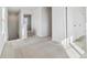 Upstairs hallway area with neutral carpet at 17969 Dandy Brush Ln, Parker, CO 80134