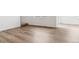 Inviting open-concept living space with modern flooring and stairs in view at 17969 Dandy Brush Ln, Parker, CO 80134