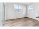 Bright living space with large windows and modern flooring at 17969 Dandy Brush Ln, Parker, CO 80134