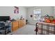 Comfortable bedroom with ample dresser space and a sun-filled window at 27857 E 8Th Ave, Aurora, CO 80018