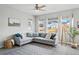 Bright living room with large windows providing ample natural light and comfortable seating at 27857 E 8Th Ave, Aurora, CO 80018