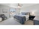 Serene primary bedroom with a ceiling fan, window view, and stylish furnishings at 27857 E 8Th Ave, Aurora, CO 80018
