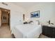 Cozy bedroom with a comfortable bed, framed art, and modern furnishings, offering a relaxing retreat at 7885 Yampa River Ave, Littleton, CO 80125