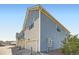 View of home exterior showing the attached garages at 7885 Yampa River Ave, Littleton, CO 80125