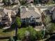 Bird's-eye view of backyard with a well-manicured lawn, trees, and outdoor recreational equipment at 9617 Silent Hills Ln, Lone Tree, CO 80124
