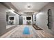 Spacious home gym with mirrors, wood-look floors, and ample workout space at 1291 S Gaylord St, Denver, CO 80210