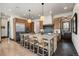 Gourmet kitchen with island, stainless steel appliances, and hardwood floors at 1291 S Gaylord St, Denver, CO 80210