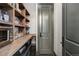 Walk-in pantry with custom shelving and counter space at 1291 S Gaylord St, Denver, CO 80210
