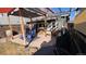Charming backyard patio with stylish pergola, outdoor furniture, and well-maintained concrete at 2033 S Ogden St, Denver, CO 80210