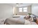 Comfortable bedroom with bed, window, and soft pillows at 2033 S Ogden St, Denver, CO 80210