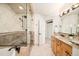 Bathroom featuring large tiled shower, built-in bench and dual sink vanity at 449 N Pearl St, Denver, CO 80203