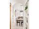 Open-concept dining area flowing into the living room at 449 N Pearl St, Denver, CO 80203