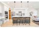 Bright kitchen with stainless steel appliances, white cabinets, and a center island at 449 N Pearl St, Denver, CO 80203