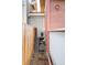 Narrow side yard featuring a wood fence, access to the basement and partial view of the home at 449 N Pearl St, Denver, CO 80203